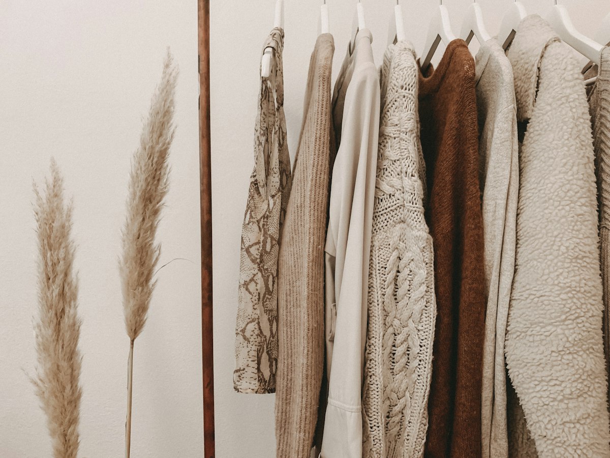 Detailed garment and costume craftsmanship in a design atelier reflecting iconic cinema styling